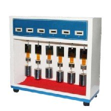 Tape retention tester with hanging weights