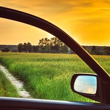 Low evening sun through a car side window
