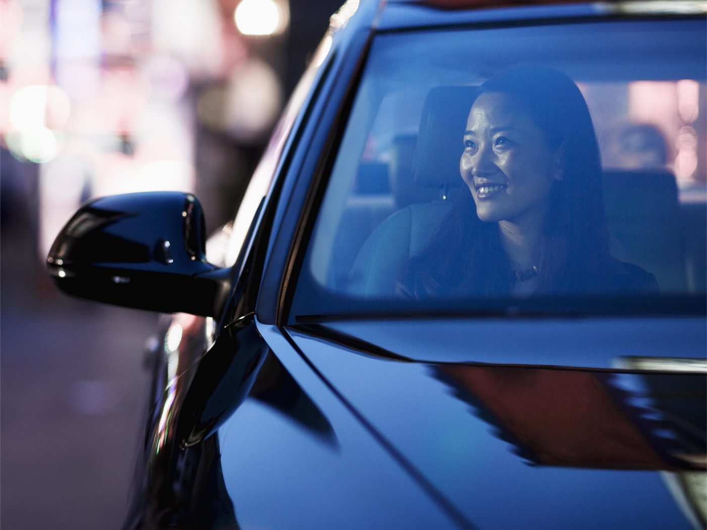 Driver clearly visible through a light 70% VLT dyed film on the front side window at night