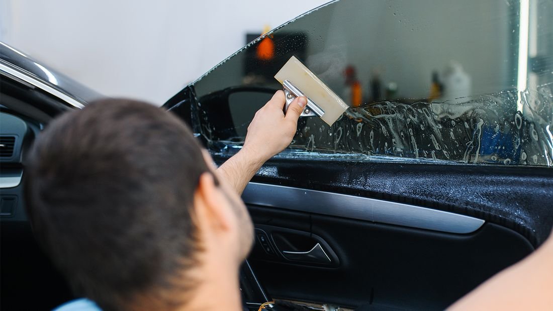 Positioning the film inside the door glass